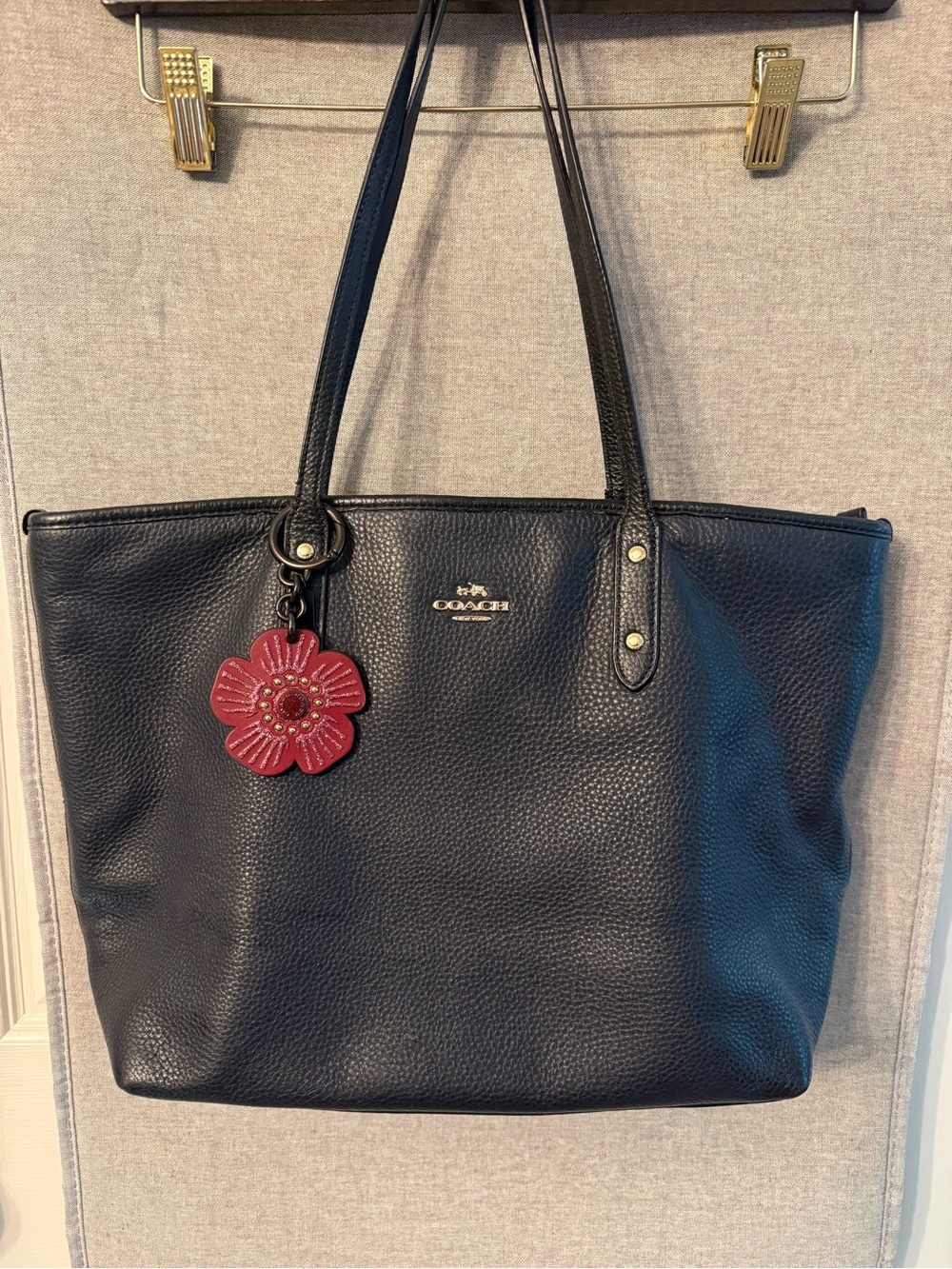 Coach Black Pebbled Leather Tote with Red Flower Charm
